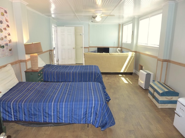 1001 Palmetto Blvd, Edisto Island, SC 29438 - bedroom with wood finished floors and ceiling fan