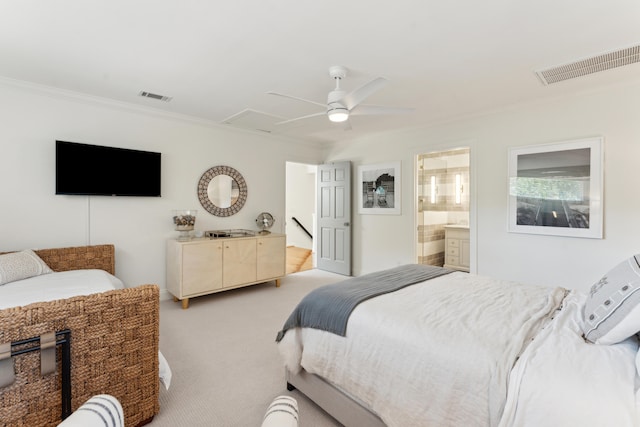 bedroom with light carpet, ensuite bath, ceiling fan, and ornamental molding