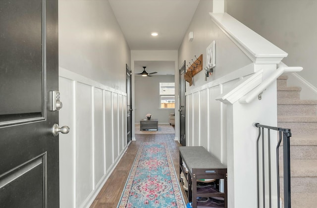 corridor featuring dark hardwood / wood-style flooring