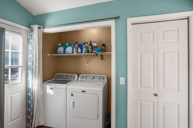 washroom with independent washer and dryer