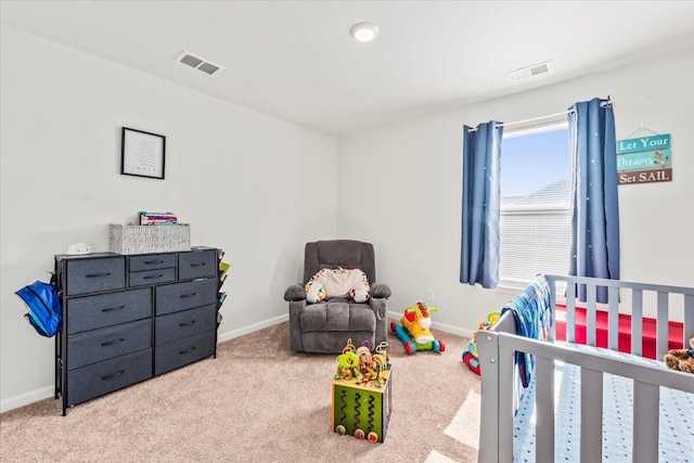 bedroom featuring light carpet