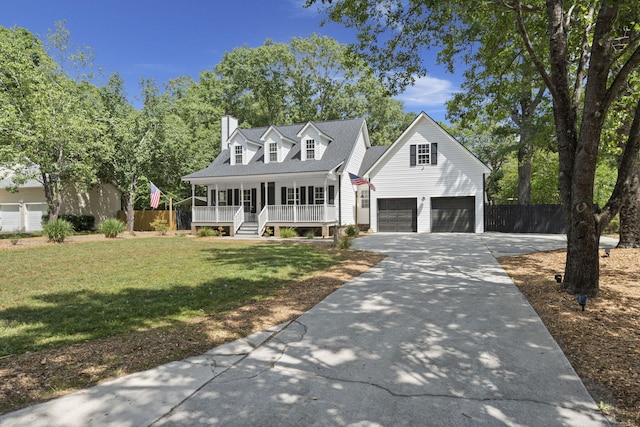 new england style home with covered porch, concrete driveway, and a chimney