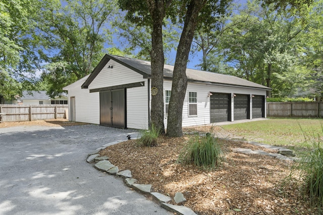 detached garage with fence