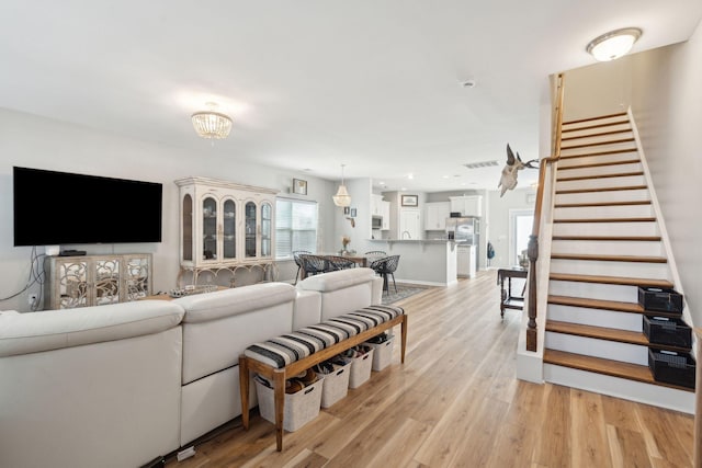 living room featuring light wood-type flooring