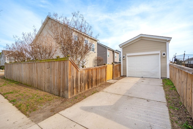 exterior space featuring an outbuilding and a garage