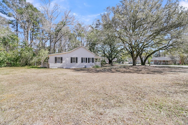 exterior space featuring a front yard