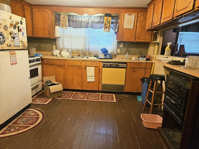 126 Rattlensnake Trl, Walterboro, SC 29488 - kitchen with white appliances and brown cabinetry