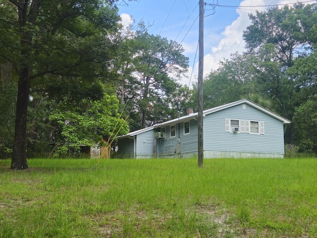 126 Rattlensnake Trl, Walterboro, SC 29488 - back of property with a chimney
