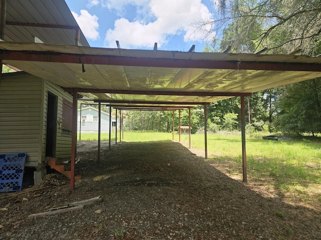 126 Rattlensnake Trl, Walterboro, SC 29488 - view of grassy yard with a carport