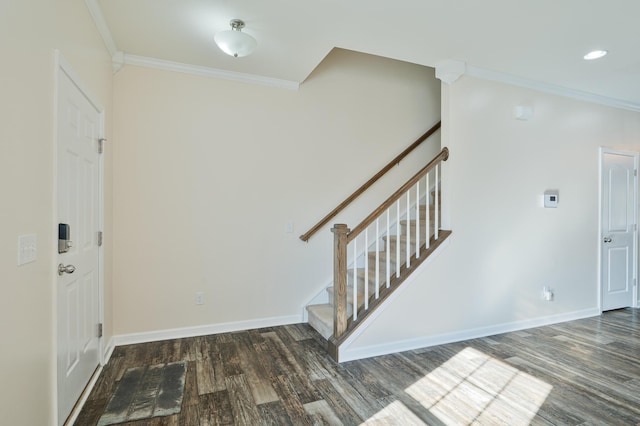 entrance foyer featuring stairway, baseboards, ornamental molding, and wood finished floors