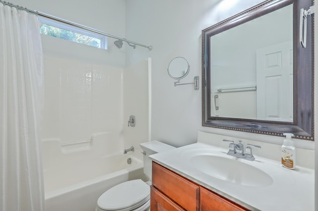 full bathroom with toilet, vanity, and shower / bath combination with curtain