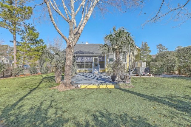 view of yard featuring a sunroom