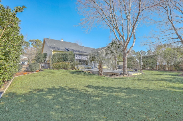 view of yard with a deck