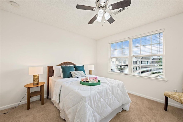 105 Brockman Way, Goose Creek, SC 29445 - carpeted bedroom with a textured ceiling and ceiling fan