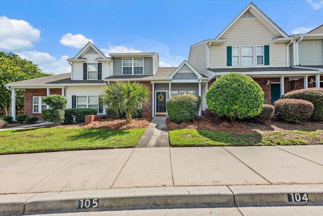 105 Brockman Way, Goose Creek, SC 29445 - view of front of home with brick siding and a shingled roof