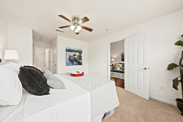 105 Brockman Way, Goose Creek, SC 29445 - bedroom with light colored carpet, a ceiling fan, and a textured ceiling