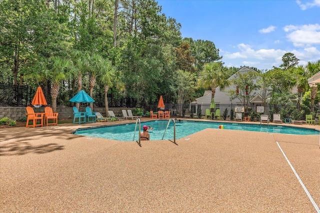 105 Brockman Way, Goose Creek, SC 29445 - community pool featuring a patio area and view of scattered trees