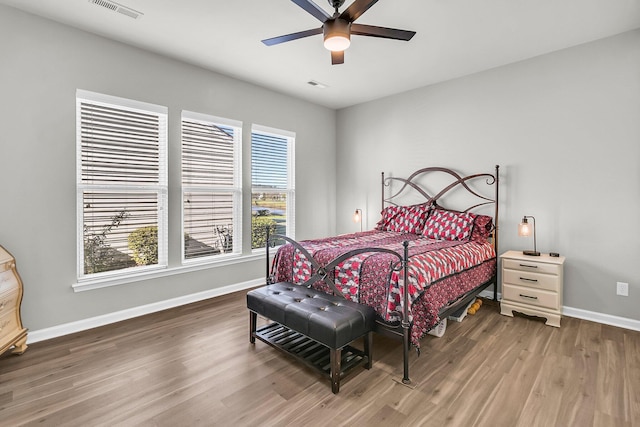 bedroom featuring ceiling fan and hardwood / wood-style floors