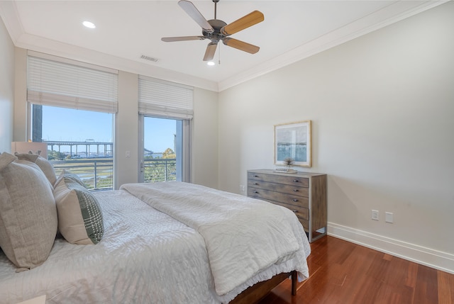 bedroom with ornamental molding, access to exterior, dark wood-type flooring, and ceiling fan