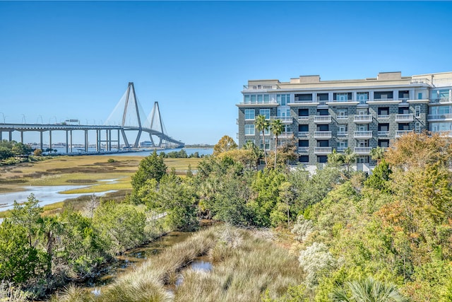 view of home's community featuring a water view