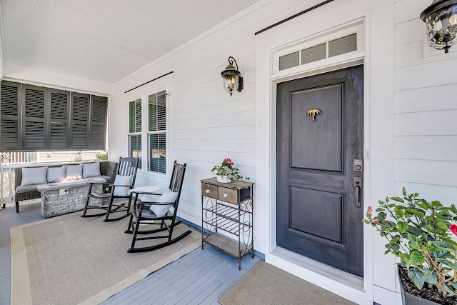property entrance featuring a porch