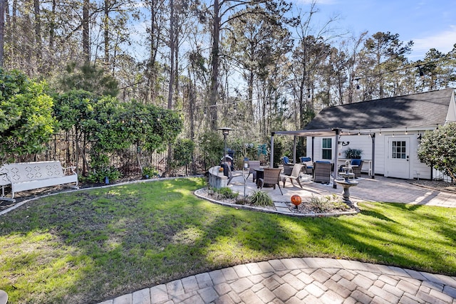 view of yard featuring a patio and fence