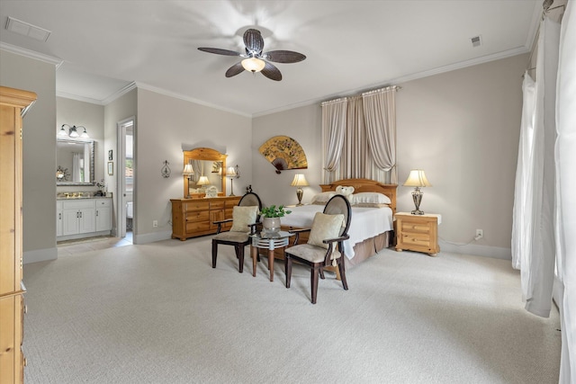bedroom with ensuite bath, ornamental molding, visible vents, light carpet, and baseboards