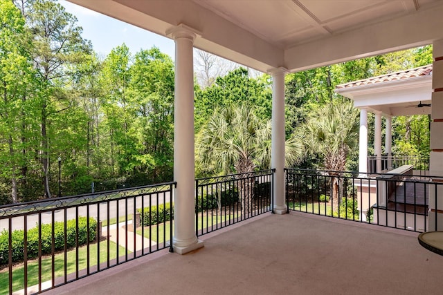 view of patio featuring a balcony