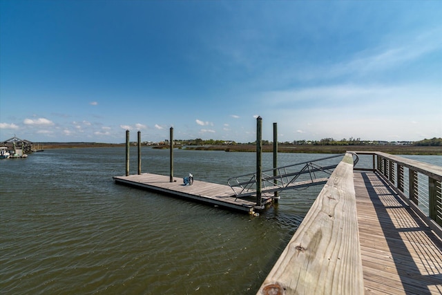 view of dock with a water view