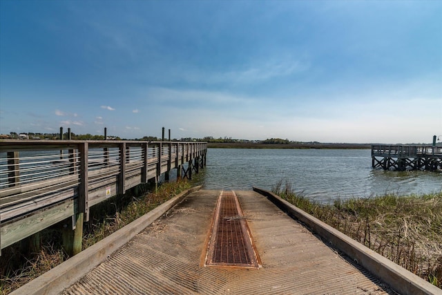 view of dock with a water view