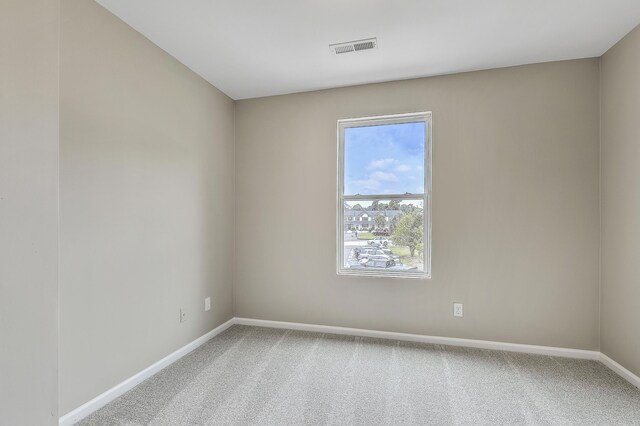 spare room with carpet flooring