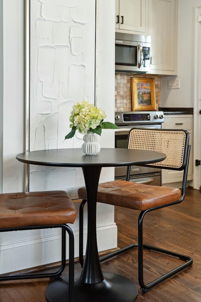 dining area featuring wood finished floors