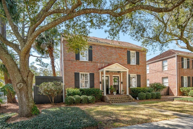 view of front of home with brick siding