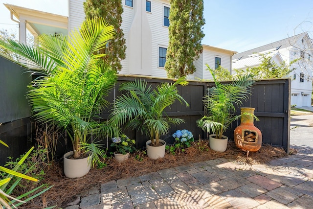 view of patio featuring fence