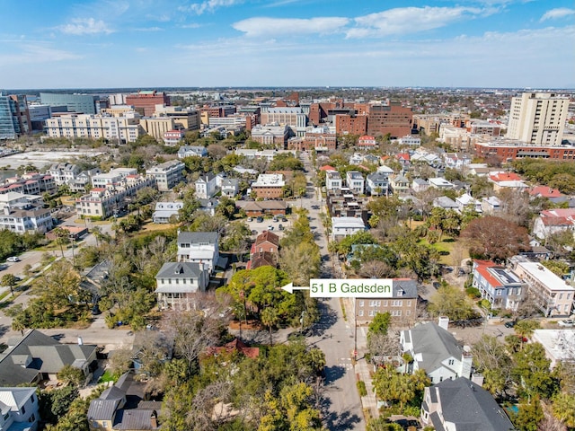 birds eye view of property with a view of city