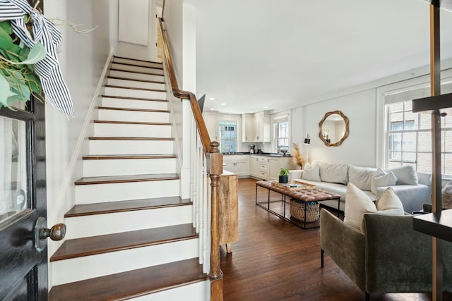 staircase featuring recessed lighting and hardwood / wood-style flooring