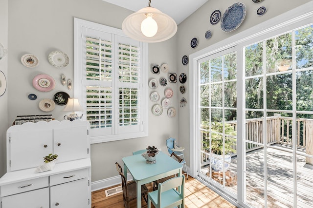 interior space with baseboards and visible vents