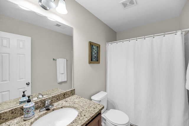 full bathroom with visible vents, curtained shower, toilet, and vanity