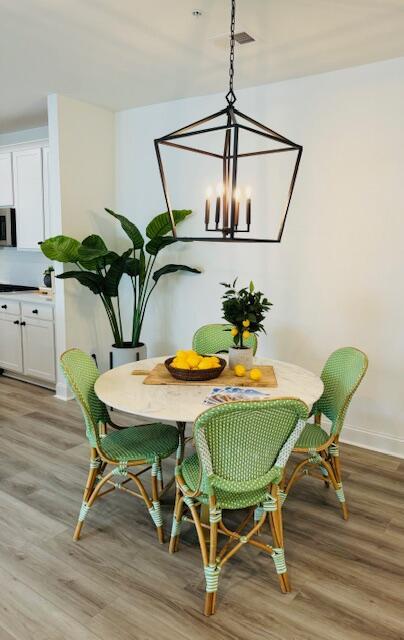 dining room with light hardwood / wood-style floors