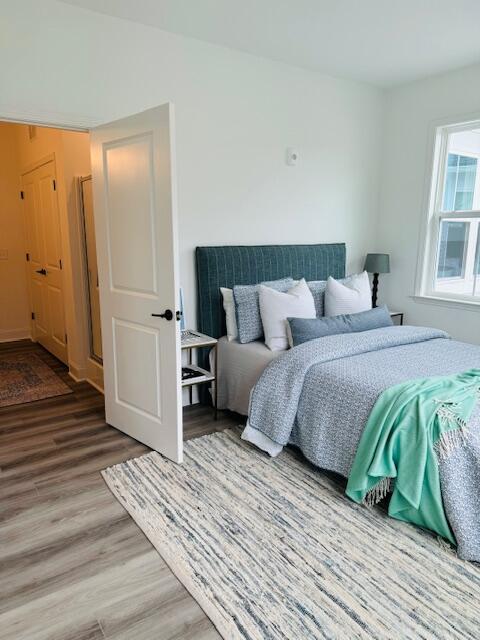 bedroom featuring hardwood / wood-style floors