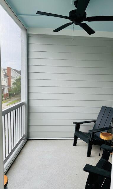 balcony featuring ceiling fan