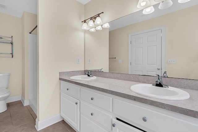 7869 High Maple Cir N, Charleston, SC 29418 - full bathroom with tile patterned flooring, toilet, double vanity, and baseboards