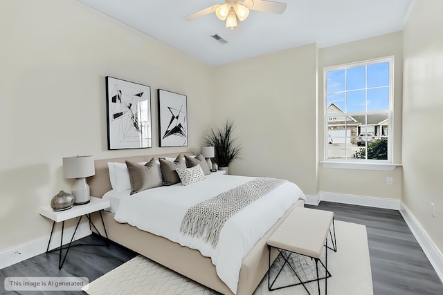 7869 High Maple Cir N, Charleston, SC 29418 - bedroom with baseboards, dark wood-style flooring, and ceiling fan