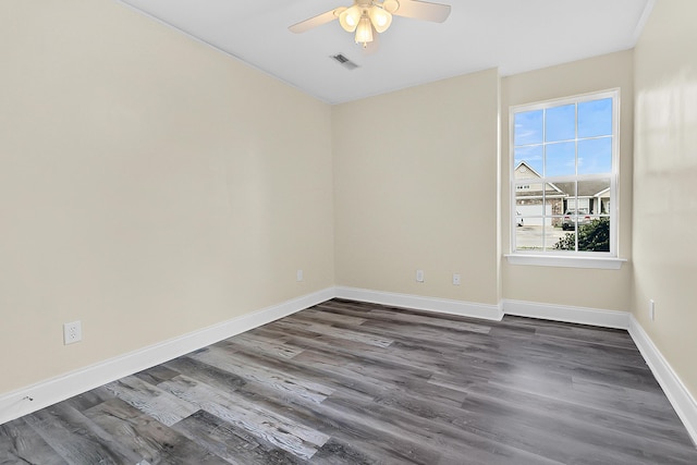 7869 High Maple Cir N, Charleston, SC 29418 - empty room with ceiling fan, dark wood-type flooring, and baseboards