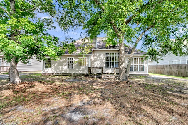 7869 High Maple Cir N, Charleston, SC 29418 - rear view of property with fence and a deck