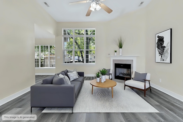 7869 High Maple Cir N, Charleston, SC 29418 - living area with wood finished floors, a ceiling fan, a fireplace, and baseboards