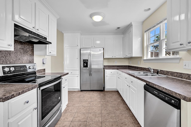 7869 High Maple Cir N, Charleston, SC 29418 - kitchen with appliances with stainless steel finishes, a sink, under cabinet range hood, dark countertops, and white cabinets