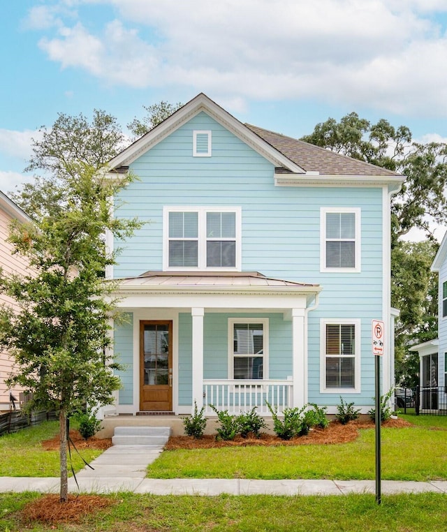 view of front facade featuring a front yard