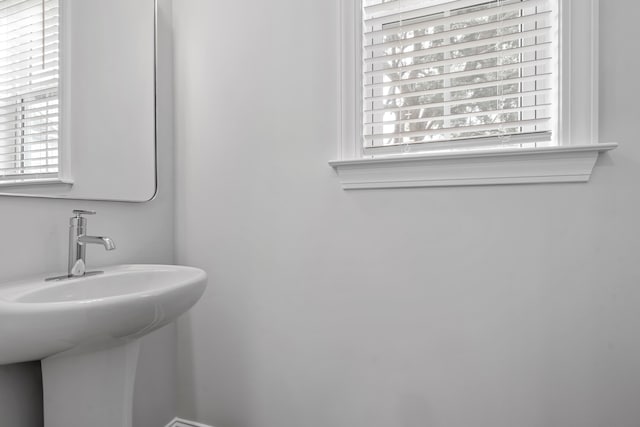 bathroom with sink and a wealth of natural light