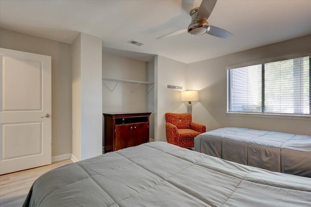8483 Yadkin Cir Unit D, North Charleston, SC 29406 - bedroom with wood finished floors, a closet, and ceiling fan